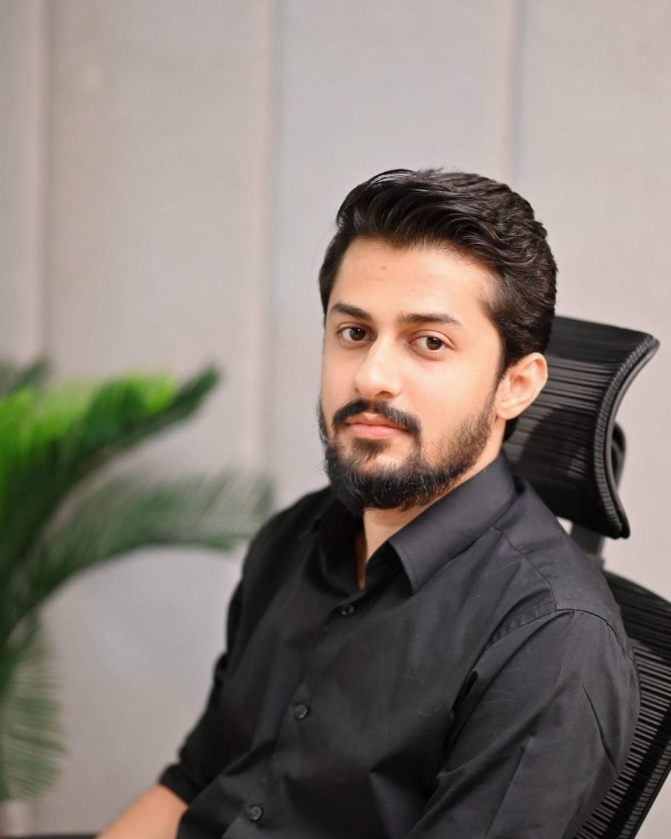 Saif, founder of Assistify, sitting at his desk